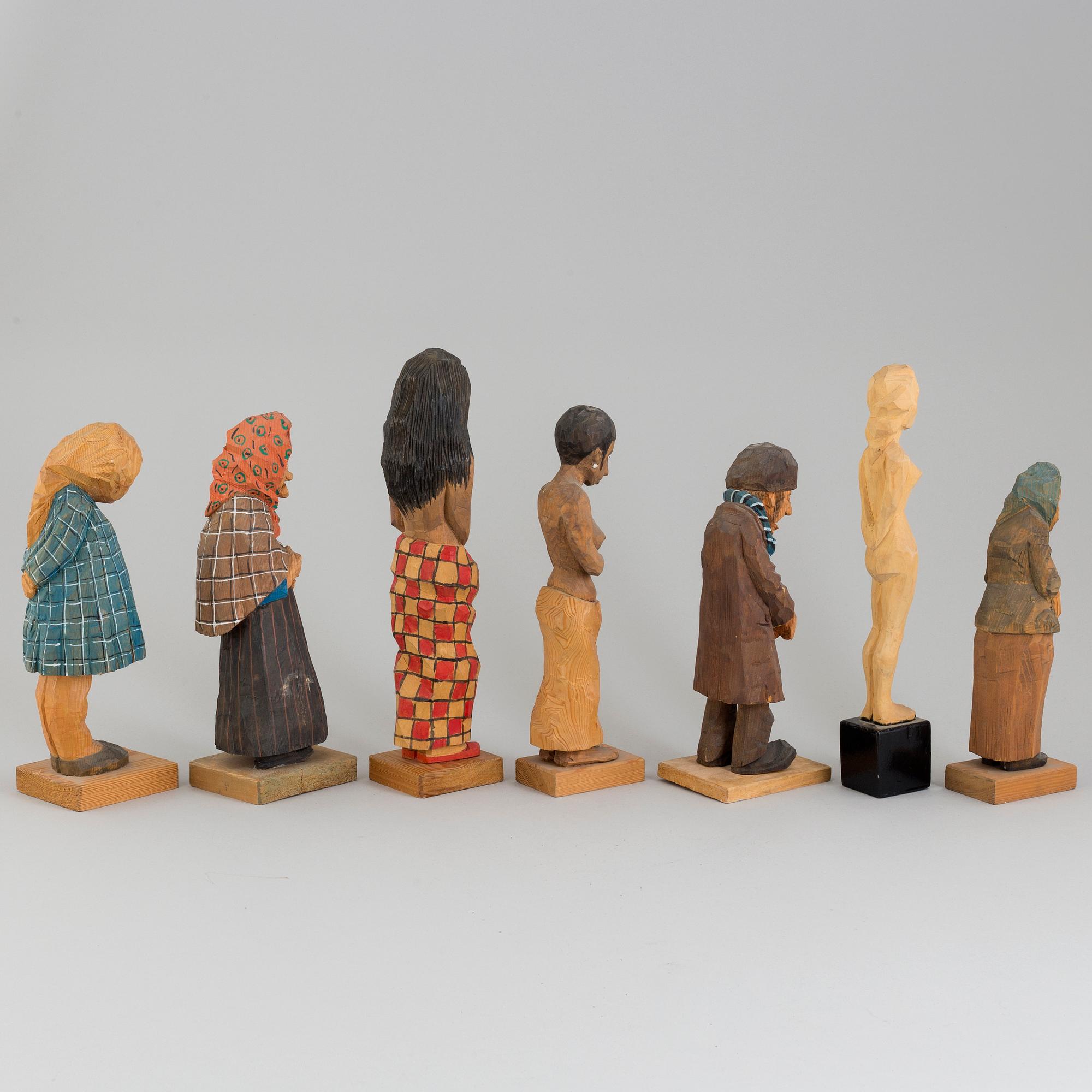 TRÄFIGURER, 7 st, signerade EK. Flertalet daterade 1969. (1 skulptur ej signerad).