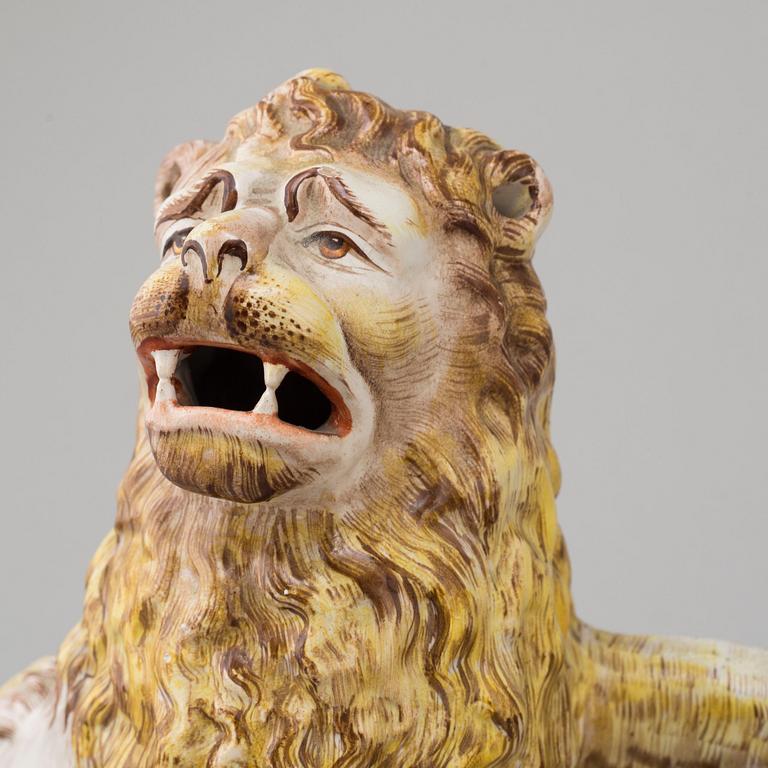 A PAIR OF FRENCH FAYENCE BOOK ENDS, 20th century.