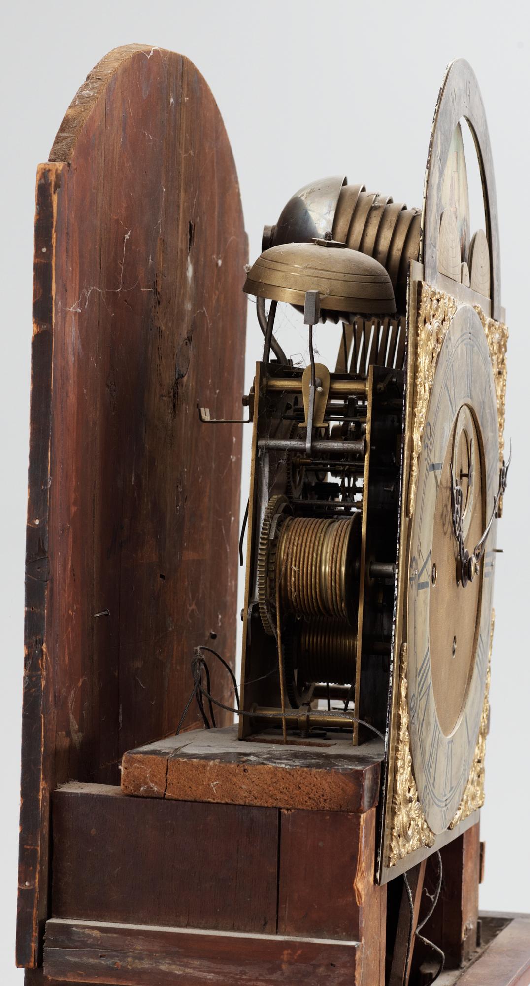 An English circa 1800 mahogany veneer longcase clock.