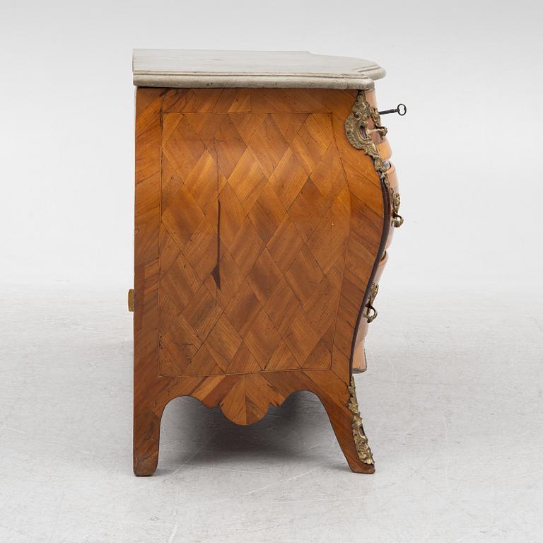 A Rococo parquetry commode, attributed to J. F. Salborg (master in Stockholm 1757-95).