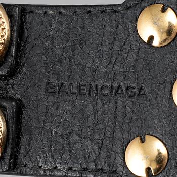 BALENCIAGA, a studded leather bracelet.