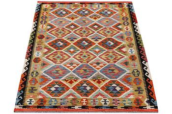 A Kilim rug, c. 201 x 147 cm.