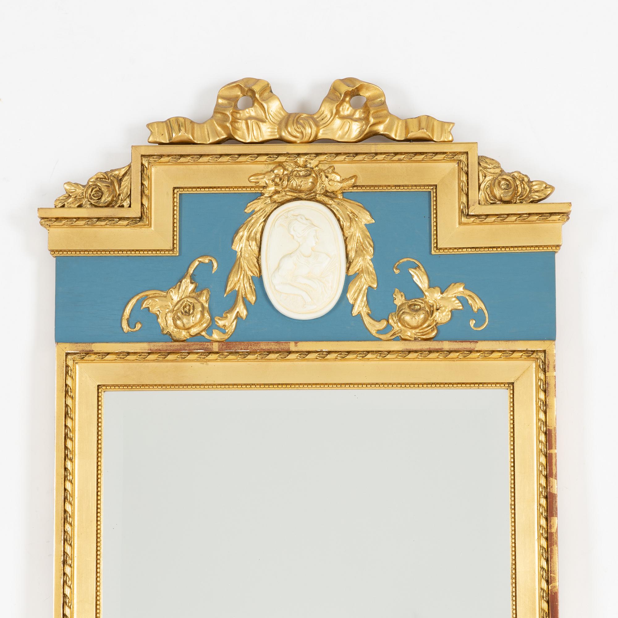 A Gustavian style console table and mirror, mid 20th century.