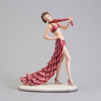 a creamware figurine by Stefan Dakon, Goldscheider, 1938.