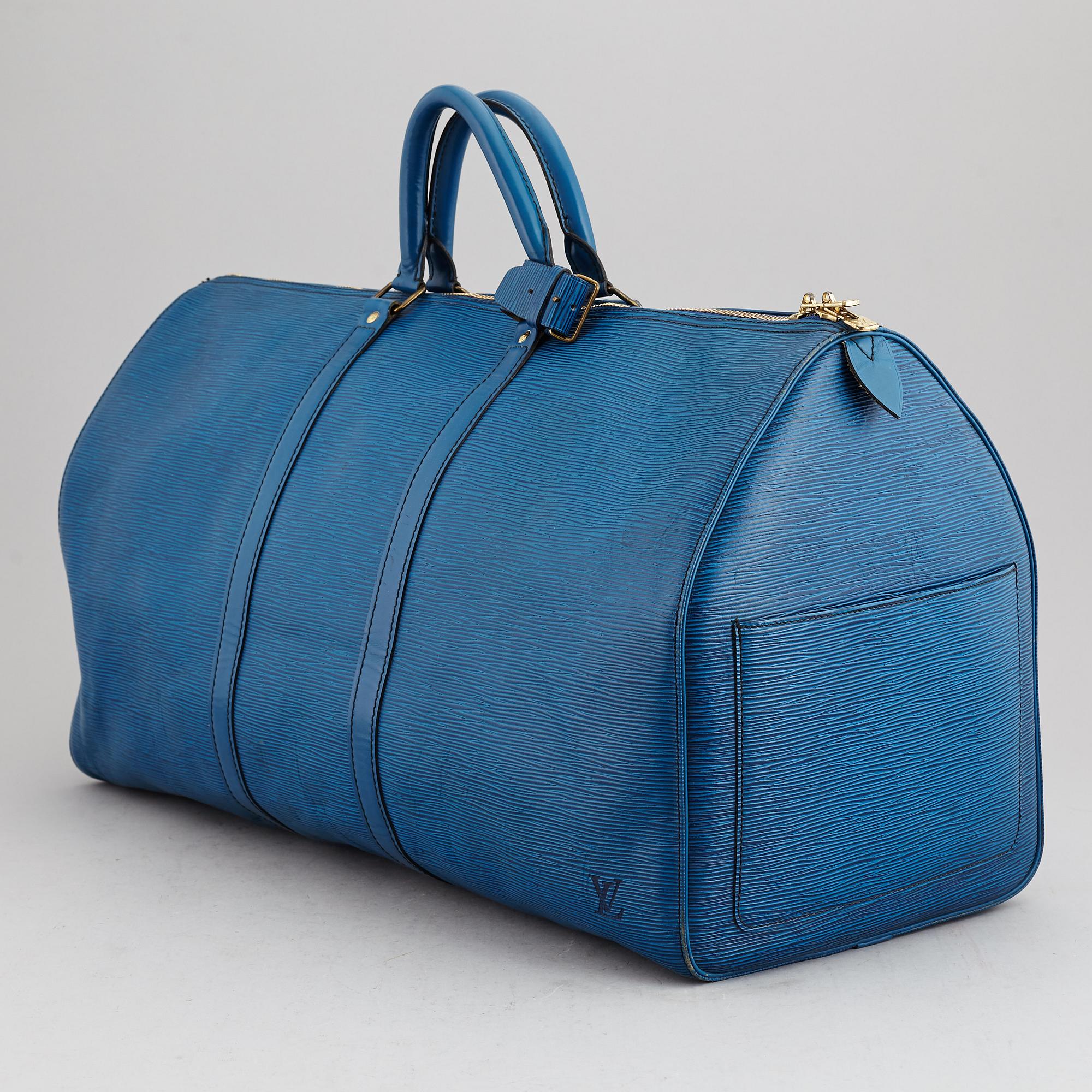 LOUIS VUITTON, a 'Keepall 55 Epi' weekendbag.