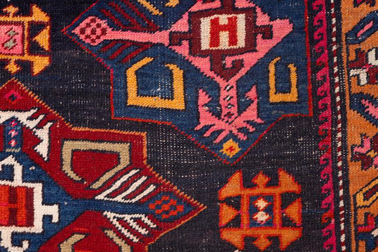 A semi-antique Anatolian runner, c. 409 x 159 cm.