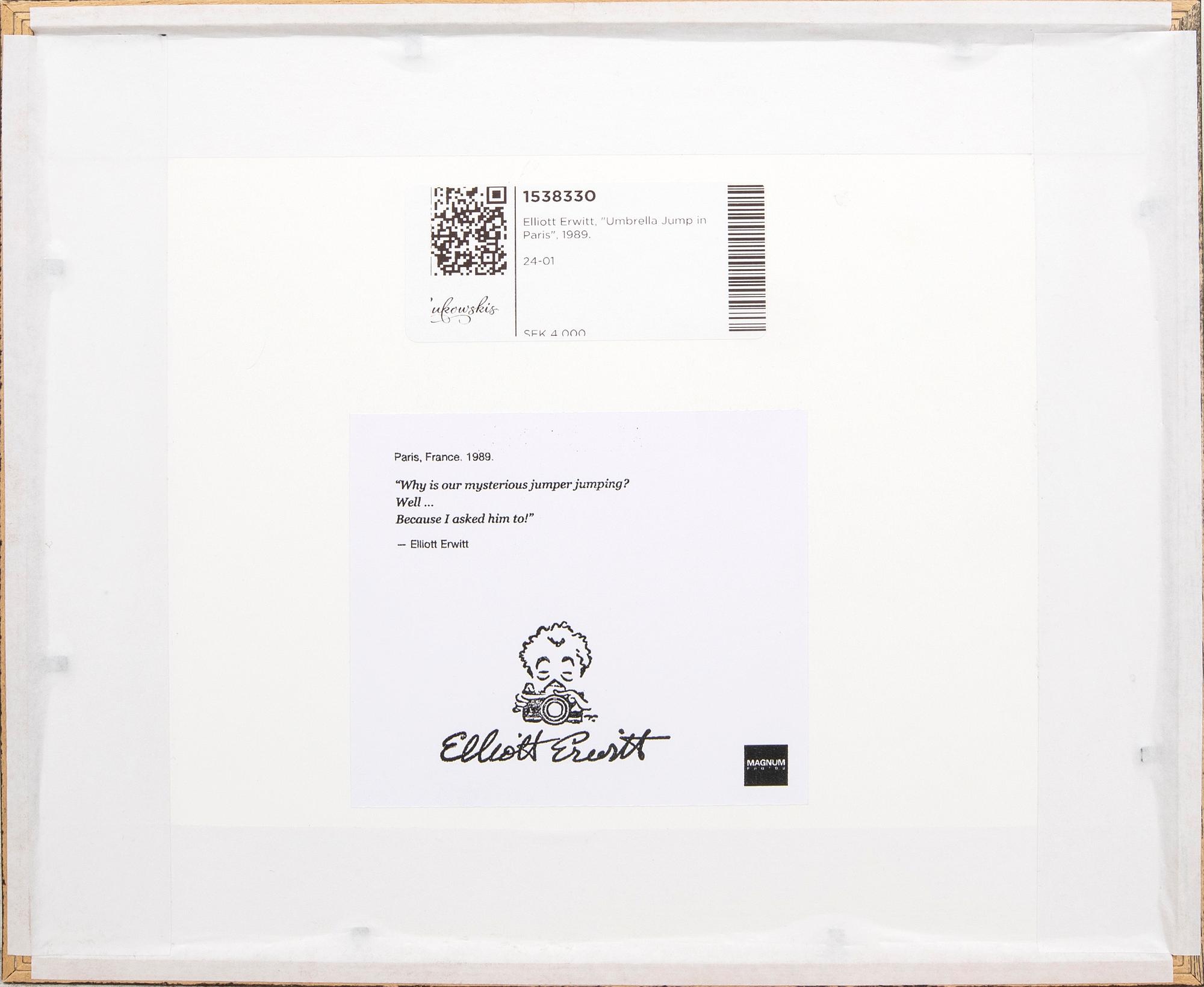 Elliott Erwitt, "Umbrella Jump in Paris", 1989.