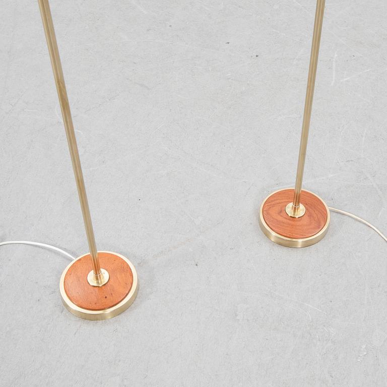 Floor lamps, a pair, mid-20th century.