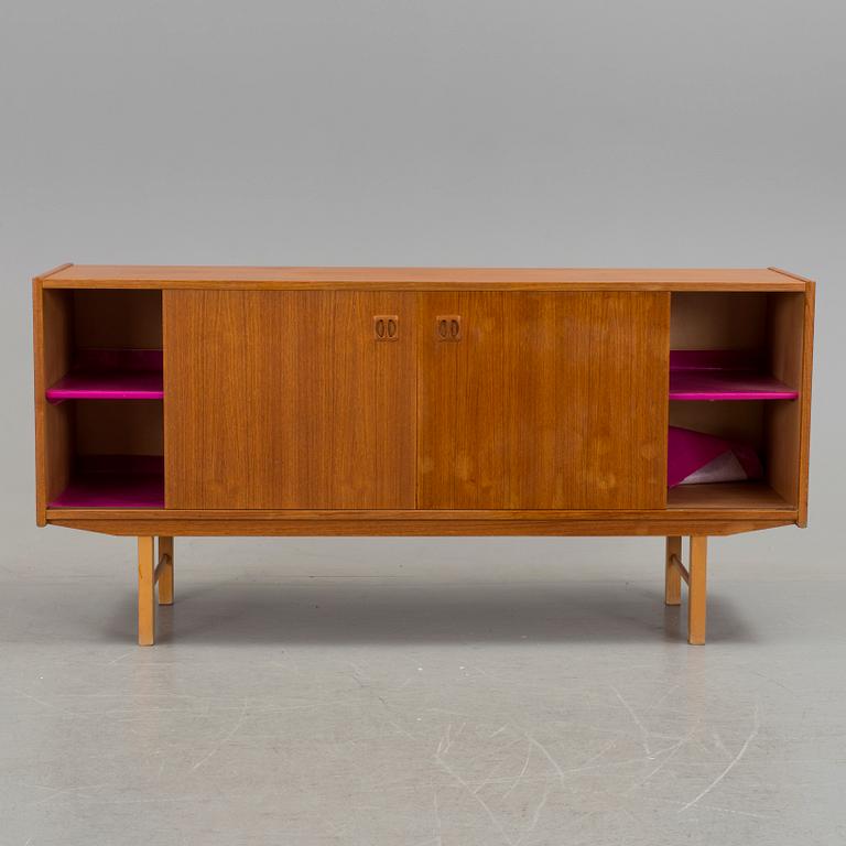 A 1960´s sideboard venereed in teak.