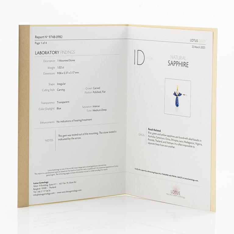 Pendant, 18K gold with carved sapphires, white sapphire, and a small rose-cut diamond.