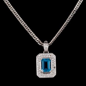 226. PENDANT, emerald cut blue topaz and brilliant cut diamonds, tot. app. 0.60 cts. Gunnar Fahlström, Stockholm.