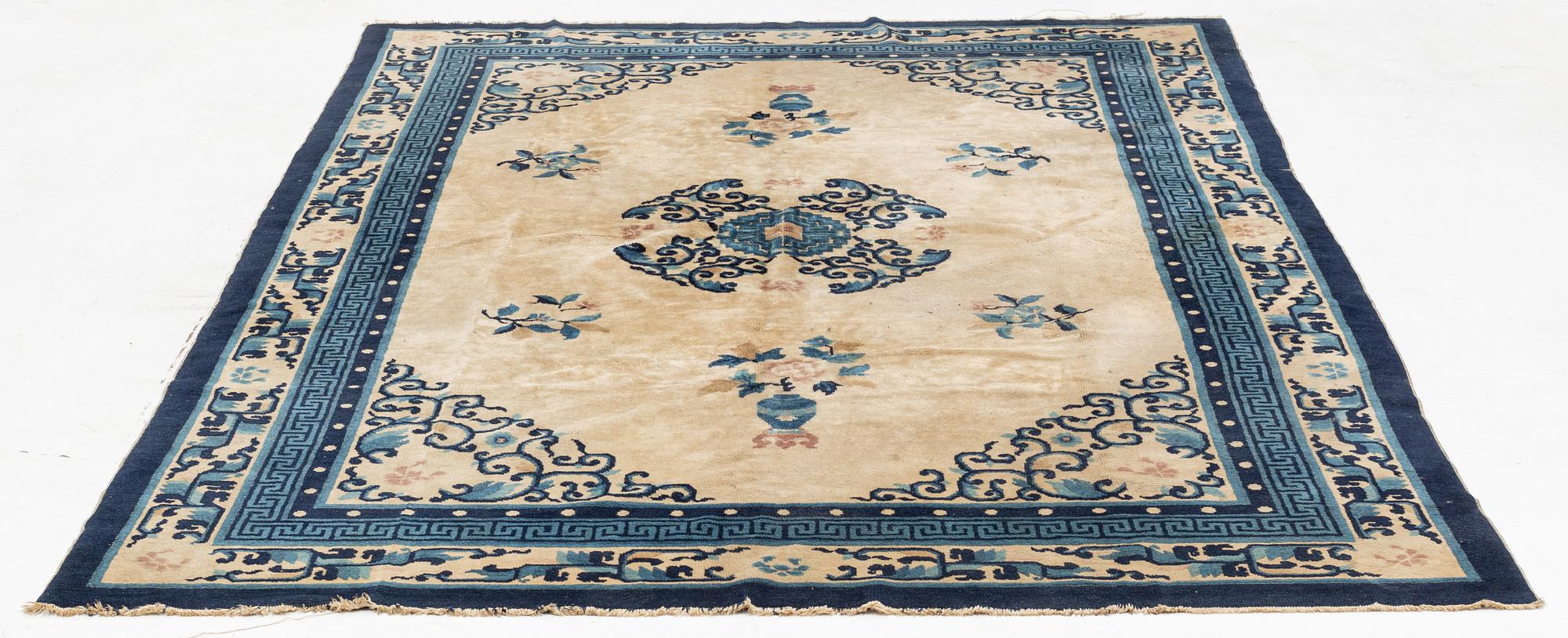 A Chinese Antique Finish rug, c. 278 x 186 cm.