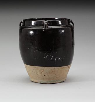 A black glazed jar, presumably Song dynasty.