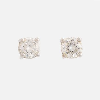 Brilliant-cut diamond earrings.