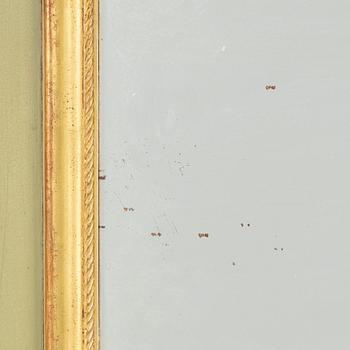 A Rococo style mirror, first half of the 20th Century.