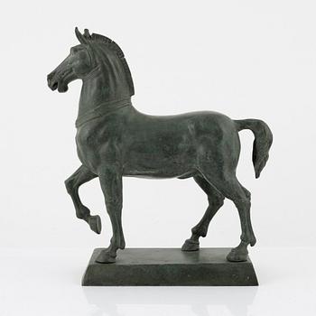 A patinated metal sculpture after the Horses of Saint Mark.