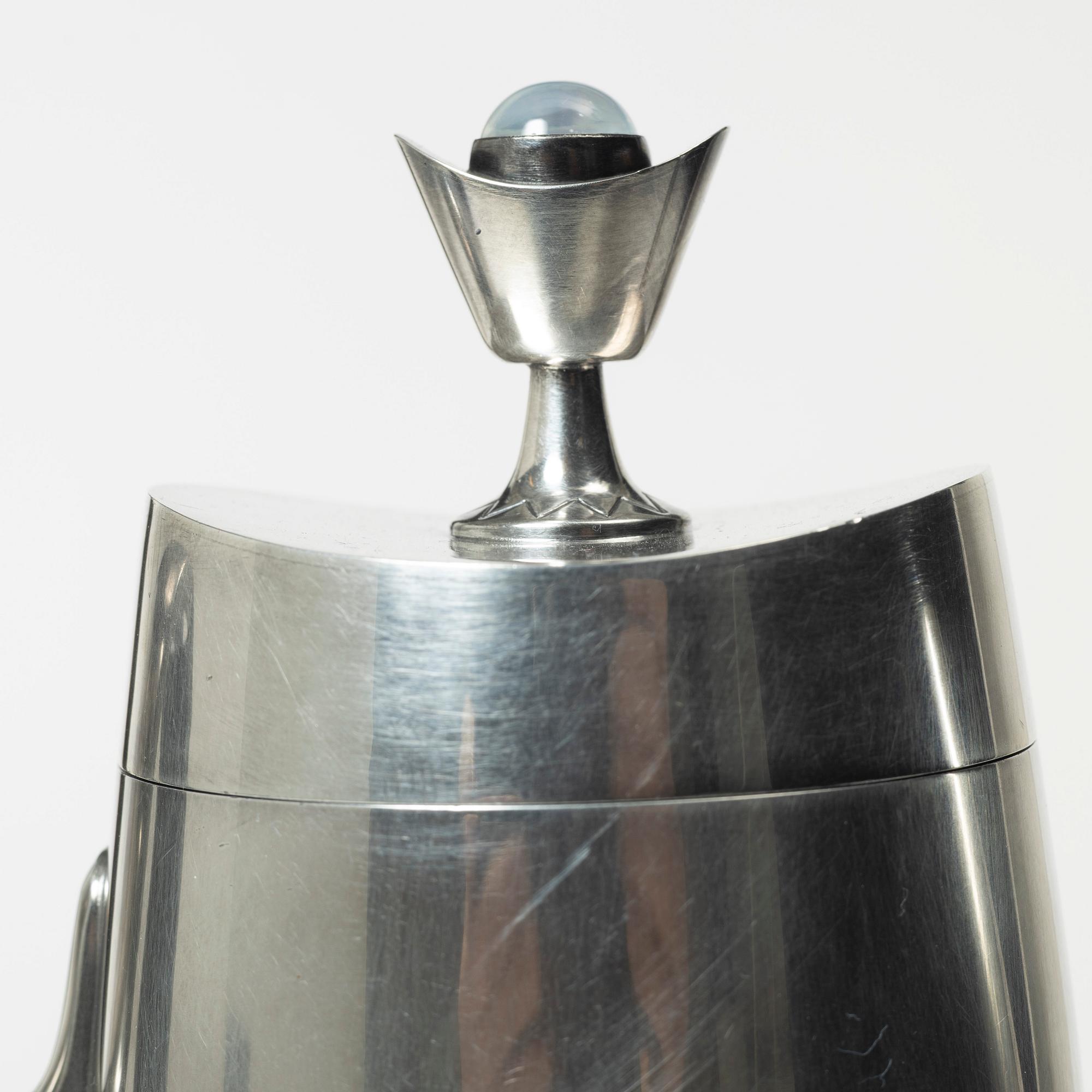 A three-piece silver coffee service by Helge Lindgren for K. Andersson, Stockholm, 1958.