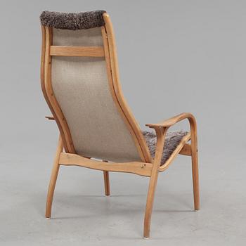 FÅTÖLJ samt FOTPALL, "Lamino", Yngve Ekström, Swedese, 1900-talets fjärde kvartal.