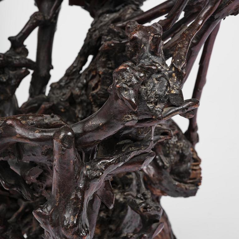 A large well sculptured root sculpture of 'Sholau and attendant', late Qing dynasty, 19th century.