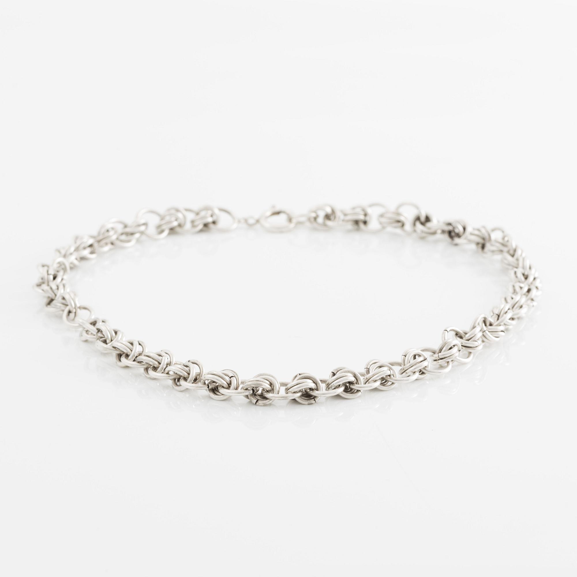 Silver necklace.