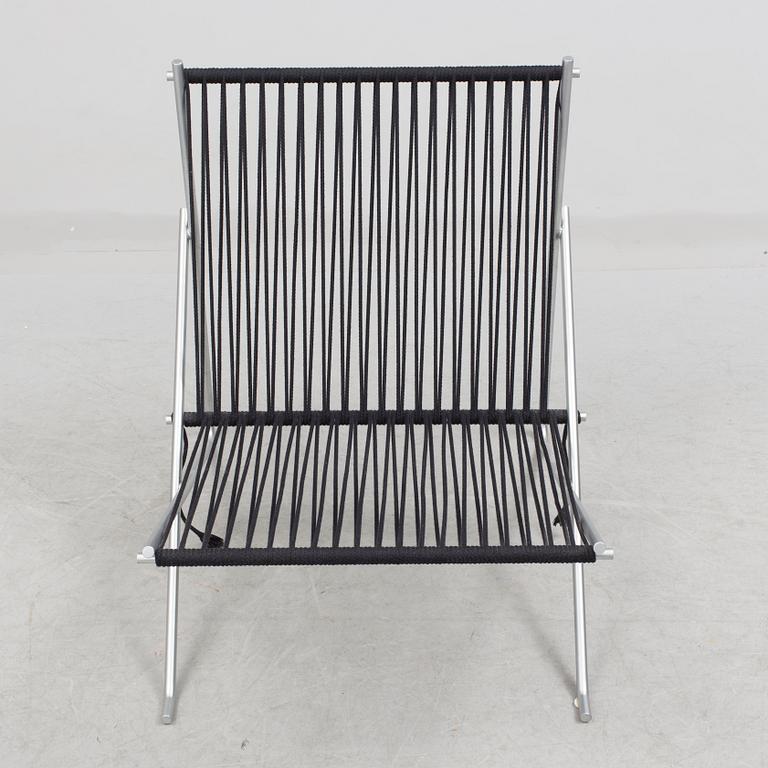A "PK-4" chair by Poul Kjaerholm, Denmark.