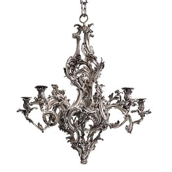 74. A highly important and rare Louis XV silvered brass
five-light chandelier  attributed to Pierre Boulanger, Paris c 1750.