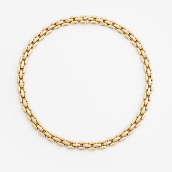 An 18K gold Cartier necklace.