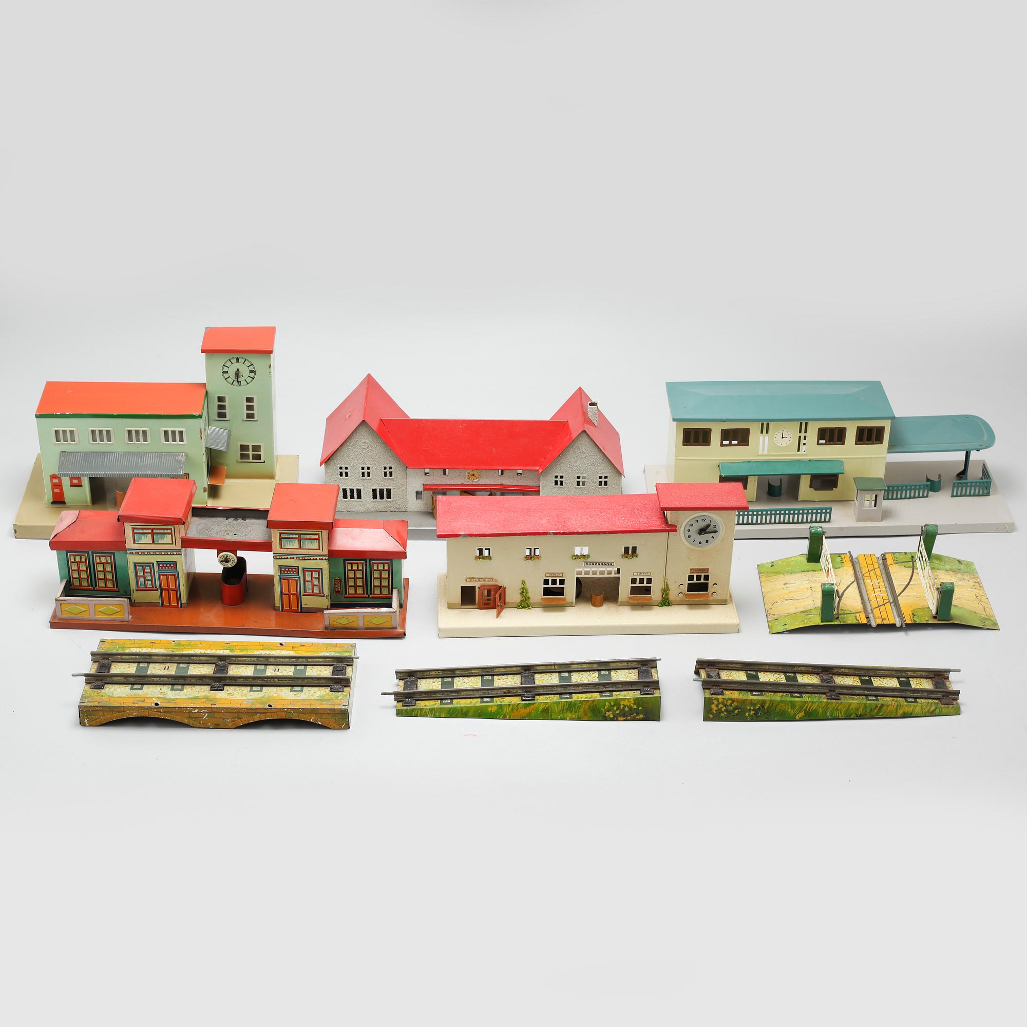 Eight 20th century train model accessories, Germany and England.