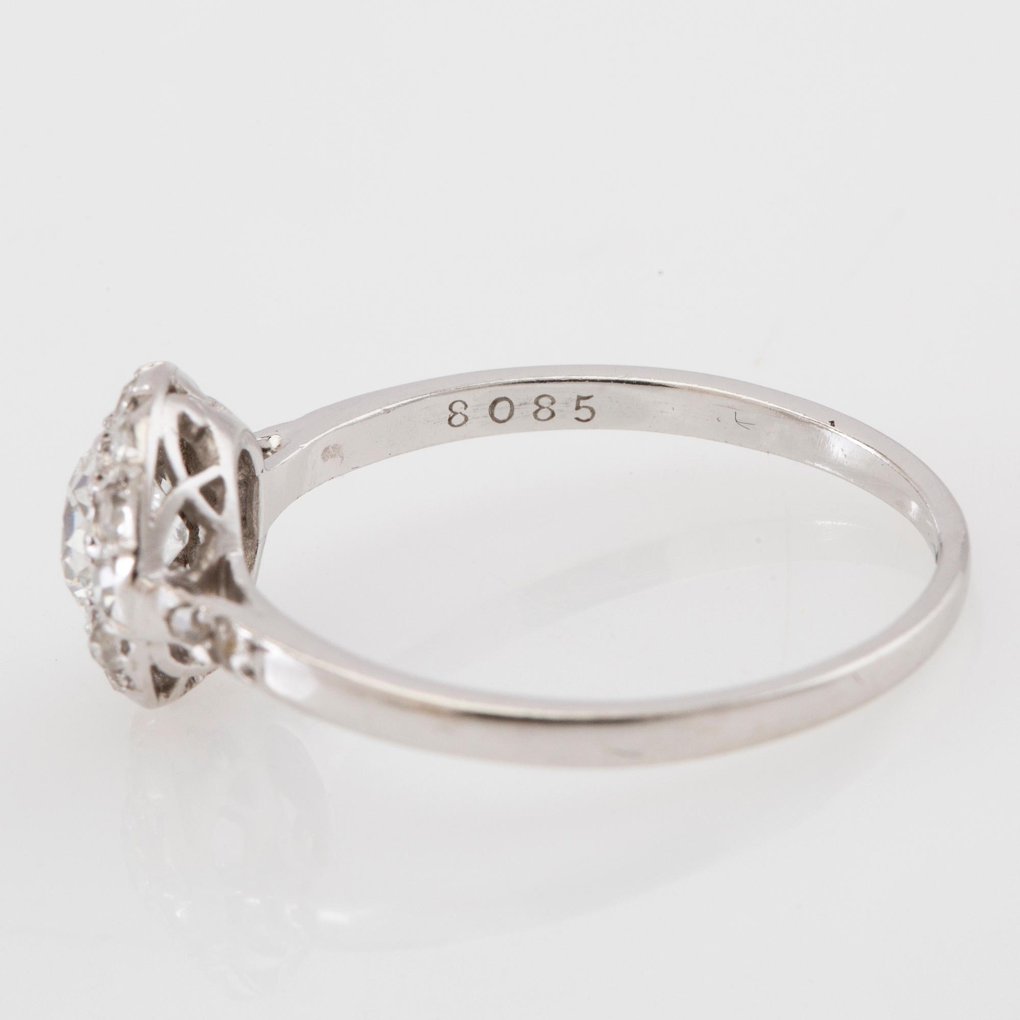 Platinum ring set with old-cut diamonds.