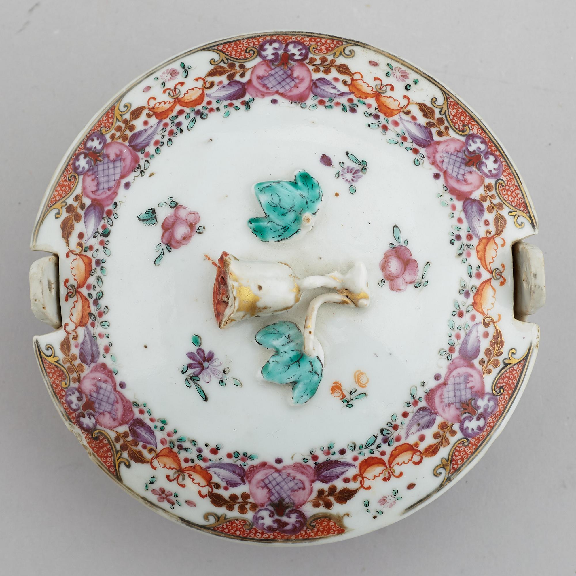 A famille rose butter tureen with cover and two cups with three odd stands, Qing dynasty, Qianlong (1736-95).