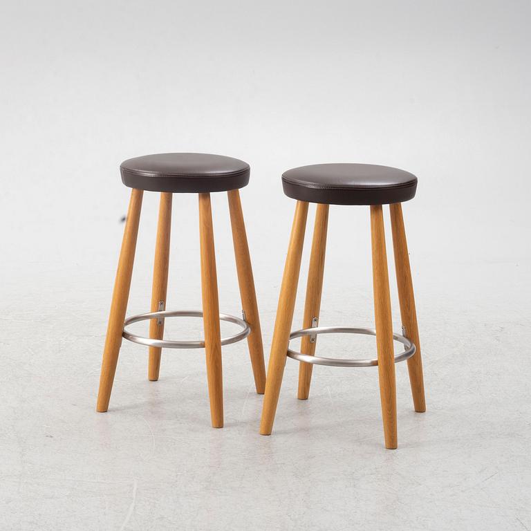 Hans J. Wegner, a pair of bar stools, CH 58, Carl Hansen & Son, Denmark, 21st century.