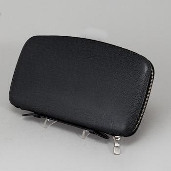 LOUIS VUITTON, an 'Atoll Ardiose' Taiga leather trave organizer, 2015.