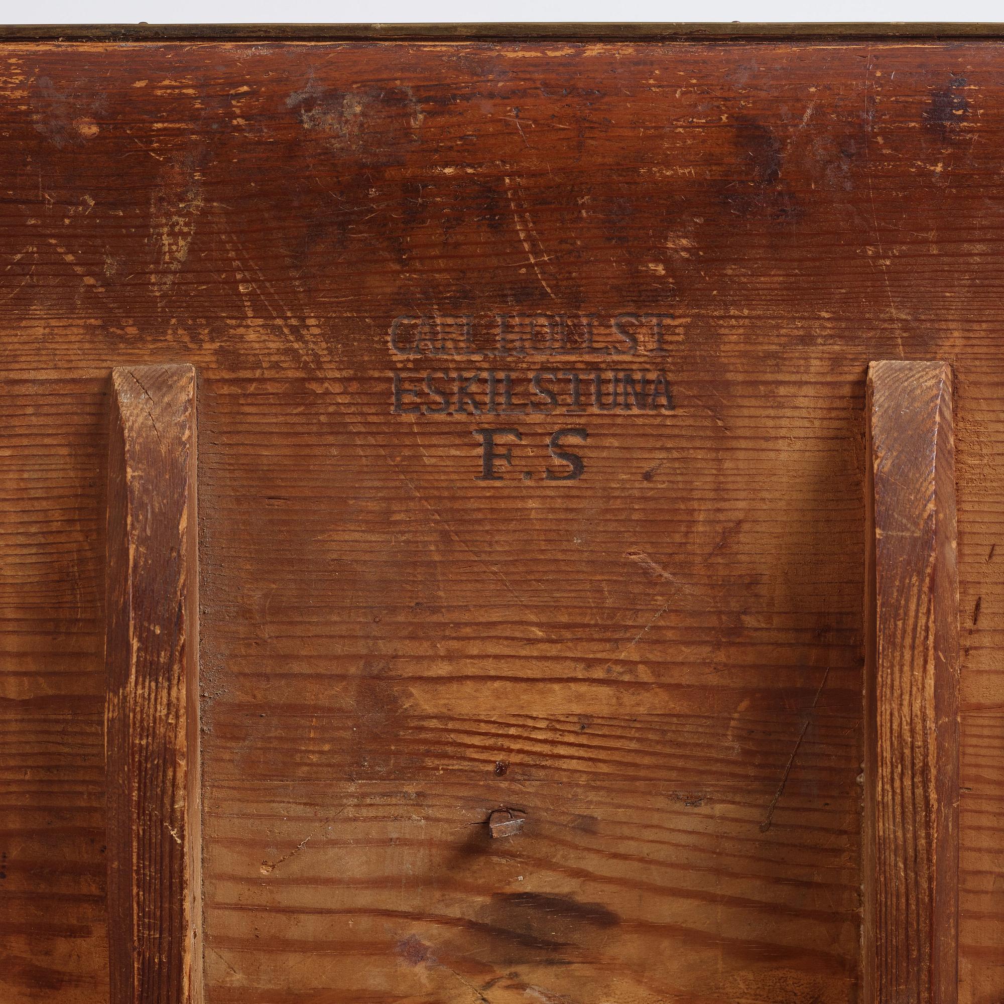 A pair of alder-veneered tilt-top tables by C. Hollst (master 1787-1830).