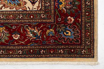 A Tabriz carpet, Northwestern Iran, of Safavid 'palmette' design, c, 483 x 302 cm.