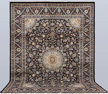 A Keshan carpet, approx. 400 x 295 cm.