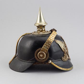 A Swedish spiked helmet 1887 pattern.