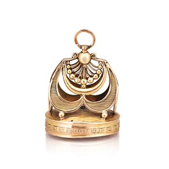 305. A gold musical fob seal. 19th Century.