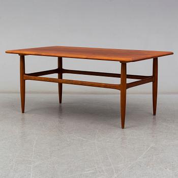 a teak coffee table from Denmark in the second half of the 20th century.