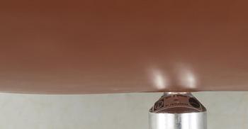 A pair of Arne Jacobsen brown leather 'Swan' chairs, Fritz Hansen, Denmark 1972.