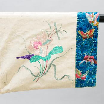 A Chinese embroidered robe, early 20th Century.