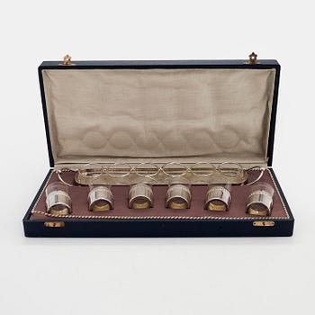 A set of six shot glasses with a tray in original fitted box, silver and glass, likely Norway 1910s.