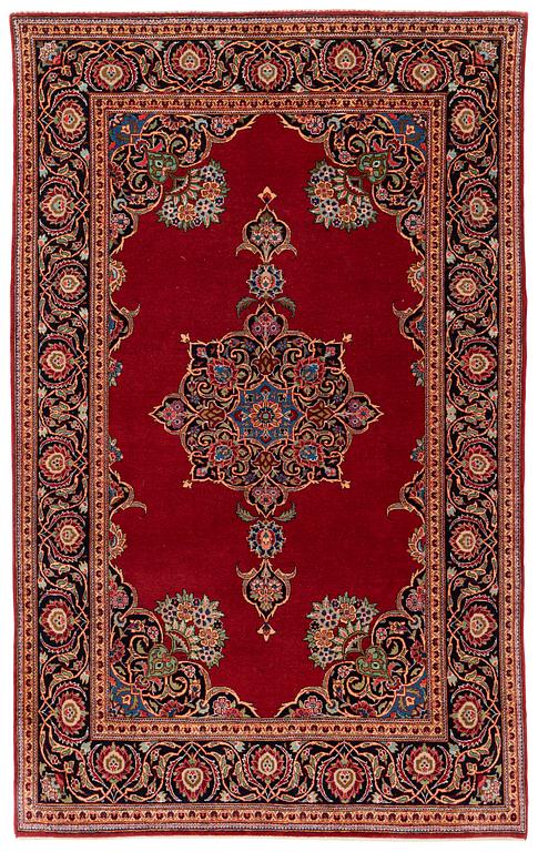 A semi-antique Kashan rug, ca 212 x 134 cm.