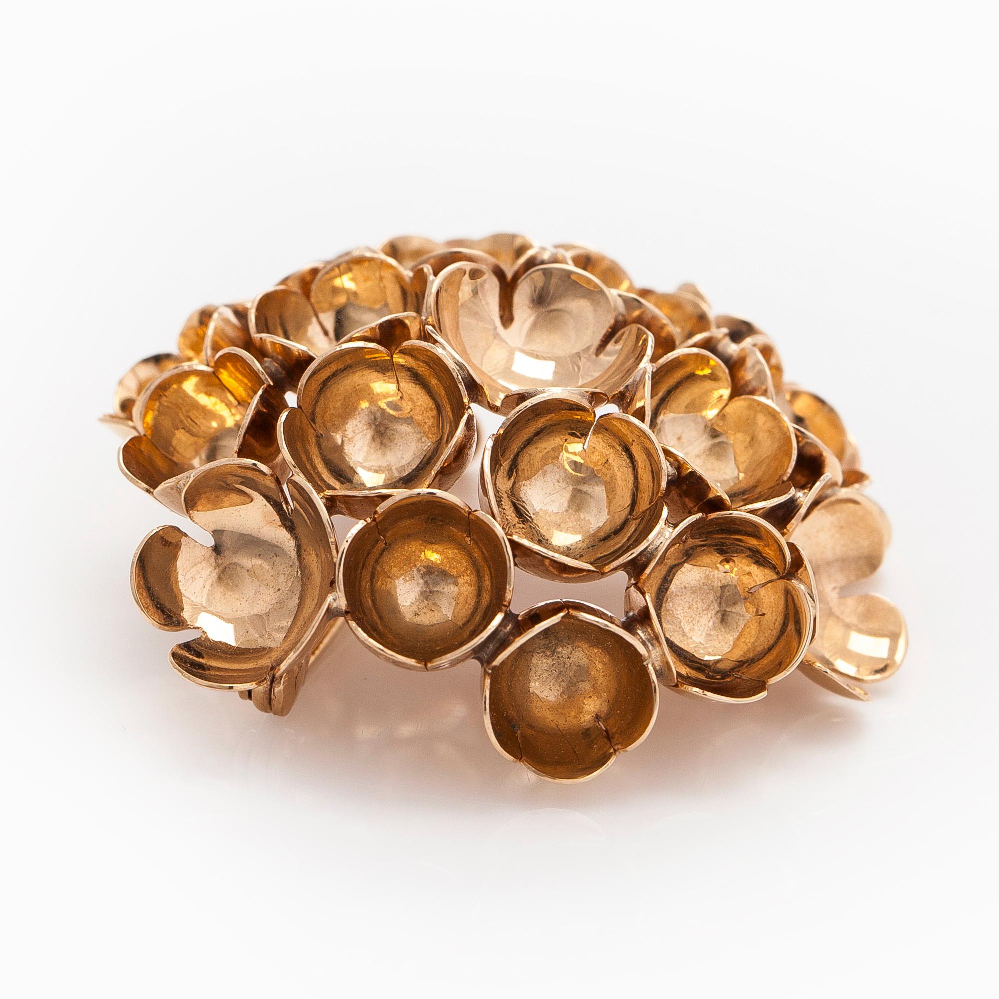 Liisa Vitali, A 14K gold brooch "Spring" Westerback Helsinki 1967.