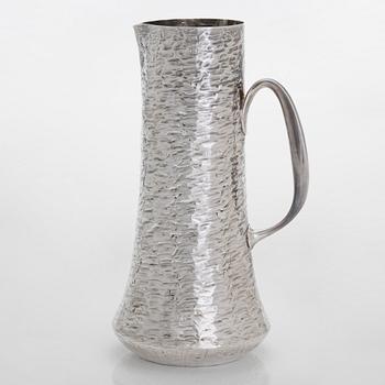 Tapio Wirkkala, a sterling silver pitcher with eight beakers, Hämeenlinna Finland 1973-1978.