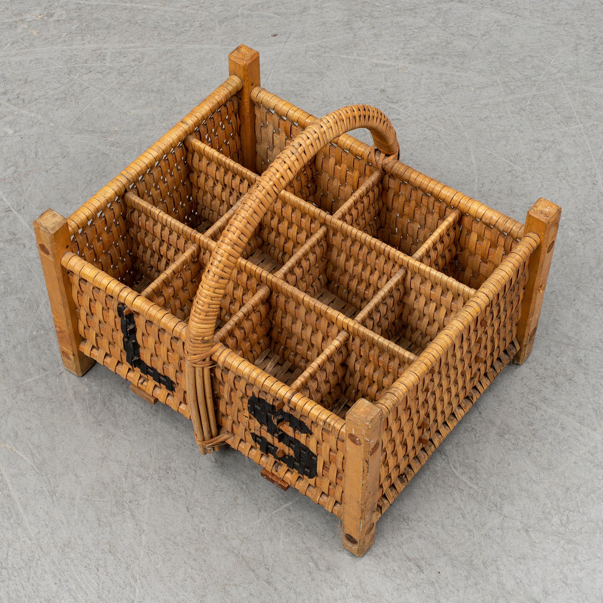 A rattan bottle basket.