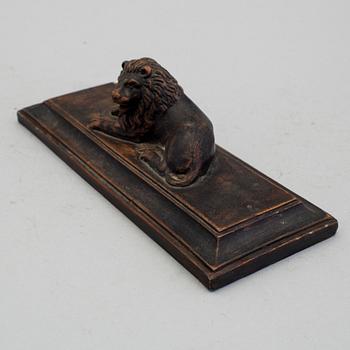 A mid 1800s terracotta paperweight.