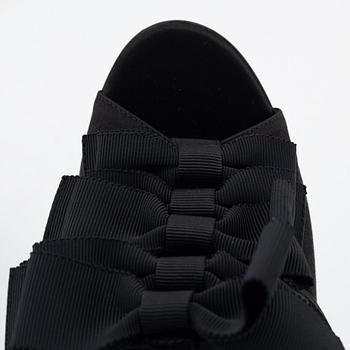 Yves Saint Laurent, a pair of black silk and bows platform sandals, size 37.