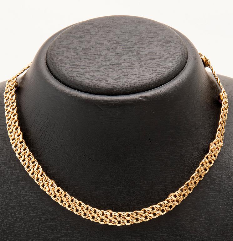 Halsband x-länk 18K guld med cabochonslipade ametister, Anetoft & Persson Stockholm 1961.