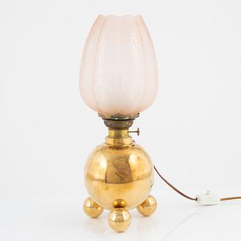 A brass and glass table light, Gusum, first half of the 20th Century.