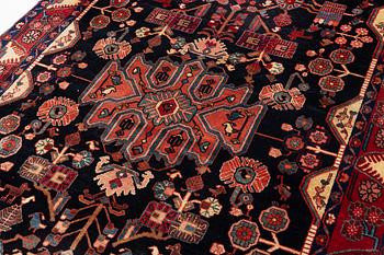 A oriental rug, c. 245 x 150 cm.